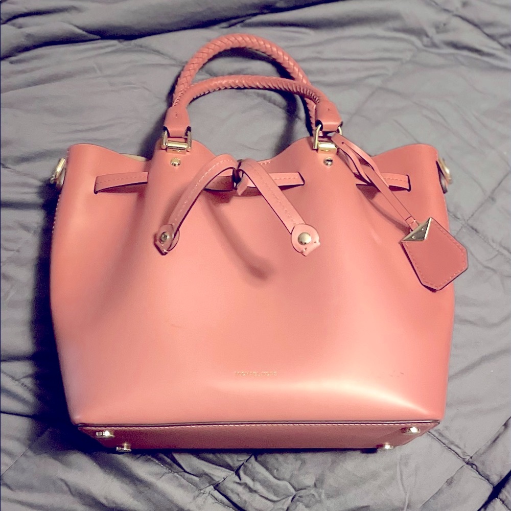 Michael Kors pink purse and wallet both with removable straps